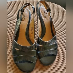 Women's black high heel open toe sling back adjustable strap shoe. Size 11